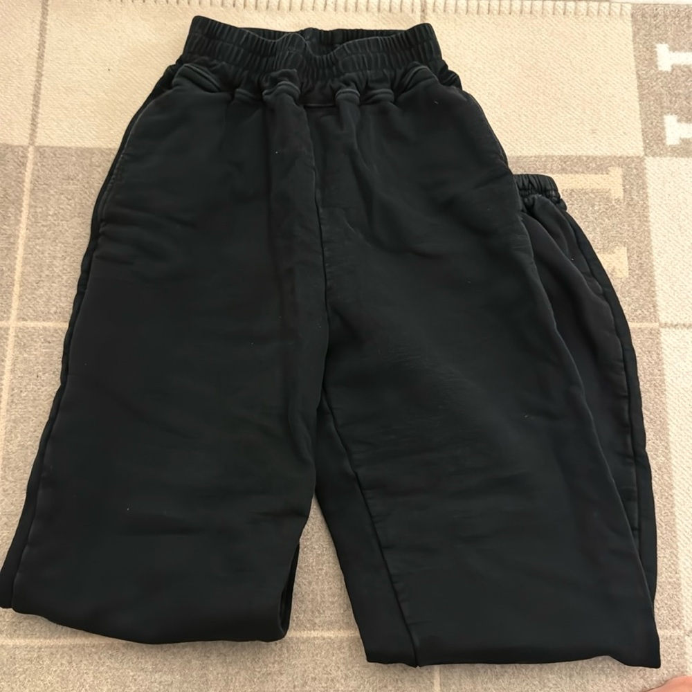 Simon miller sweats black with Simon miller embroidered on the back of leg
